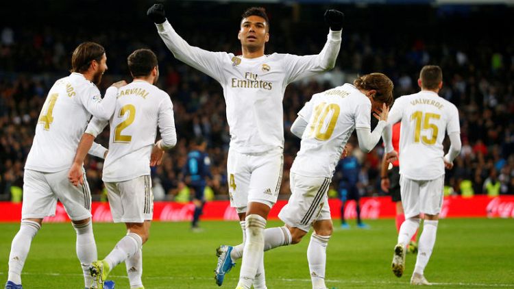 Real Madrid recover from Ramos blunder to keep pace with Barca