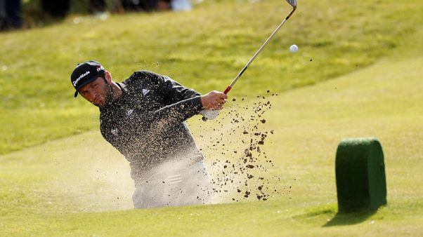Rahm holds off Fleetwood for double Dubai delight Rahm holds off Fleetwood for double Dubai delight