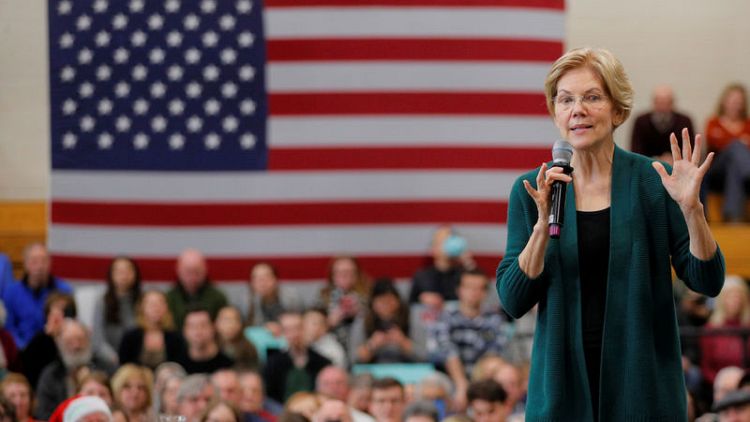 Democrat Warren accuses rival Bloomberg of trying to buy U.S. presidential election