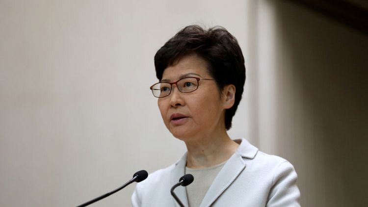 Hong Kong leader thanks residents for orderly voting despite volatile environment