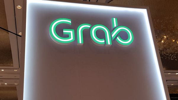 Singapore's Grab launches pilot motorbike-hailing service in Malaysia Singapore's Grab launches pilot motorbike-hailing service in Malaysia