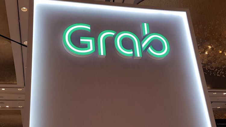 Singapore's Grab launches pilot motorbike-hailing service in Malaysia