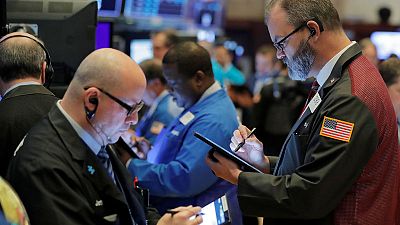 Stocks near record highs on trade hopes, dollar gains Stocks near record highs on trade hopes, dollar gains