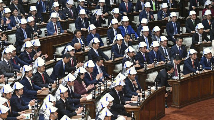 Japan MPs' disaster helmet drill sparks Twitter debate