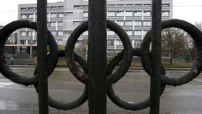 Russia, facing possible Olympic ban, pledges to work with anti-doping authorities