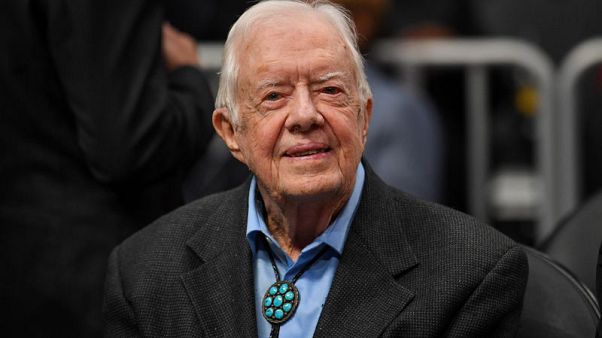 Former U.S. President Carter home for the holidays after surgery Former U.S. President Carter home for the holidays after surgery