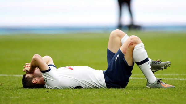 Spurs left back Davies may need ankle surgery - club Spurs left back Davies may need ankle surgery - club