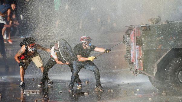 Chilean lawmakers warn democracy at stake as violence spikes Chilean lawmakers warn democracy at stake as violence spikes