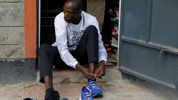Olympic hopeful Cheruiyot pushed by fellow Kenyan runner
