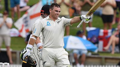Latham scores ton before rain ends first day early