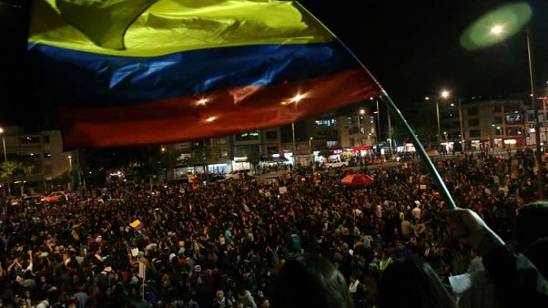 Colombia strikers expand demands, include possible talks with rebels Colombia strikers expand demands, include possible talks with rebels