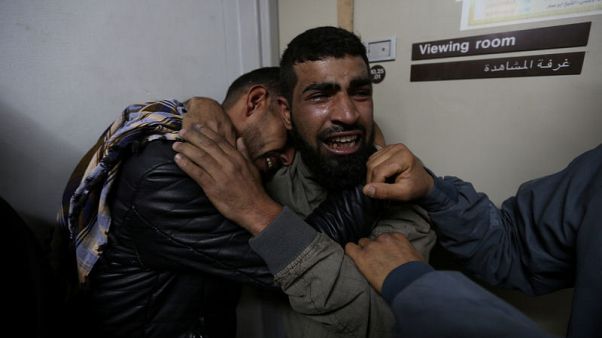 Israeli troops kill Palestinian teen at Gaza protest, Palestinians say Israeli troops kill Palestinian teen at Gaza protest, Palestinians say