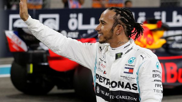 Hamilton storms to final pole of the Formula One season Hamilton storms to final pole of the Formula One season
