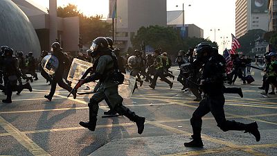 Hong Kong police fire tear gas as thousands take to the streets in fresh protests Hong Kong police fire tear gas as thousands take to the streets in fresh protests