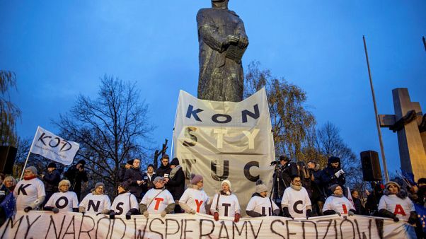 Poles protest over rule of law after judge suspended Poles protest over rule of law after judge suspended