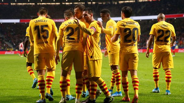 Magical Messi sinks Atletico as Barca return to the top Magical Messi sinks Atletico as Barca return to the top
