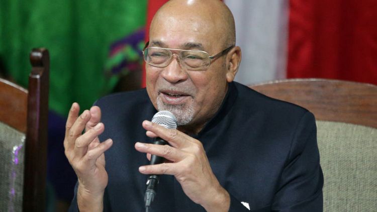 Suriname leader says he is victim of political game after murder conviction