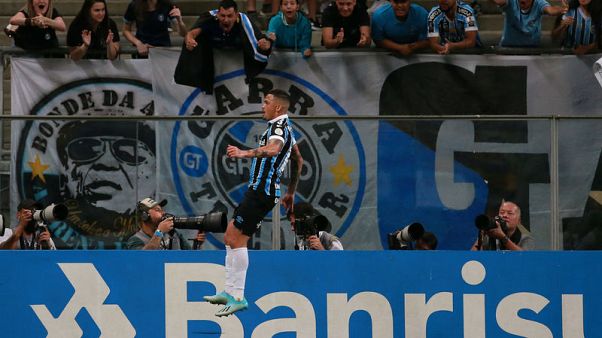Luciano double helps Gremio to 3-0 triumph over Sao Paulo Luciano double helps Gremio to 3-0 triumph over Sao Paulo
