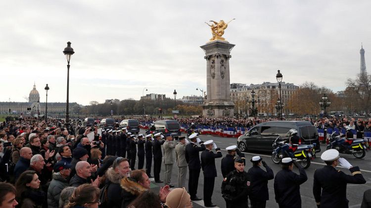 Parisians line up to mourn 13 soldiers killed in Mali