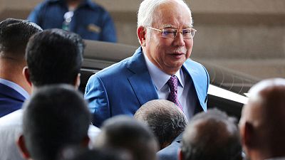 Former Malaysian PM Najib takes stand in 1MDB scandal-linked trial Former Malaysian PM Najib takes stand in 1MDB scandal-linked trial