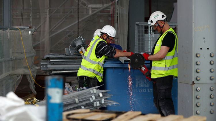 Britain's construction downturn eases a little in November - PMI