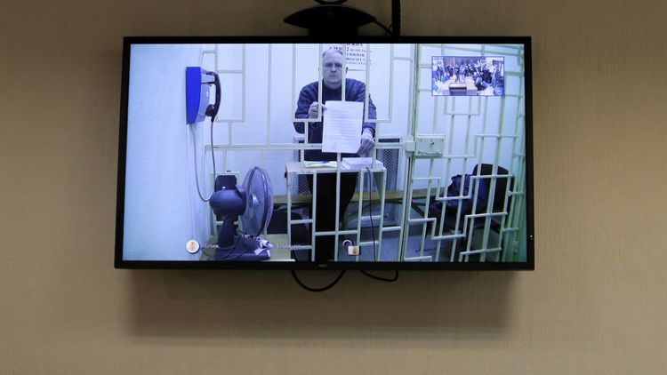 Russia accuses alleged U.S. spy of lying about his ill-treatment in jail
