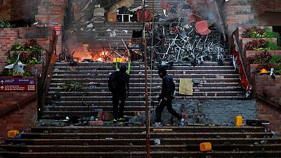 Hong Kong police retrieve fresh trove of petrol bombs from university Hong Kong police retrieve fresh trove of petrol bombs from university