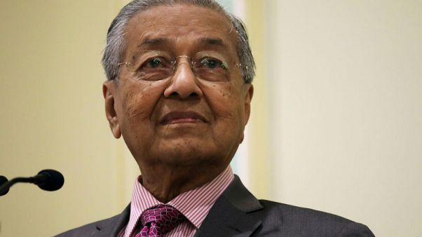 Mahathir, world's oldest prime minister, prepares to host his second APEC summit Mahathir, world's oldest prime minister, prepares to host his second APEC summit