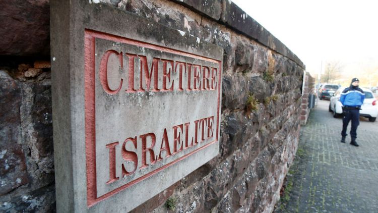 French lawmakers tackle anti-Semitism as Jewish graves desecrated