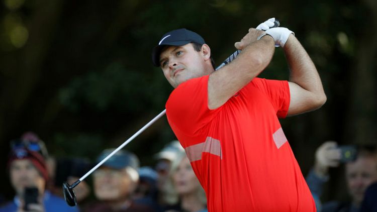 Reed, Woodland share lead in Bahamas, Woods stumbles late