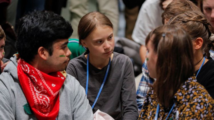 Activist Thunberg completes intercontinental dash to Madrid climate summit