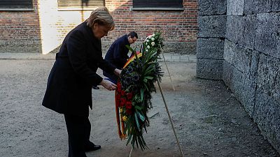 Merkel pays first visit as chancellor to Auschwitz death camp Merkel pays first visit as chancellor to Auschwitz death camp