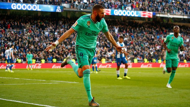 Real Madrid ease past Espanyol to move top of La Liga