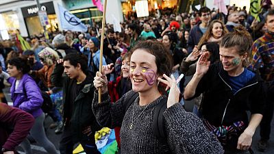 Dancing crowds protest in Madrid while climate leaders meet Dancing crowds protest in Madrid while climate leaders meet