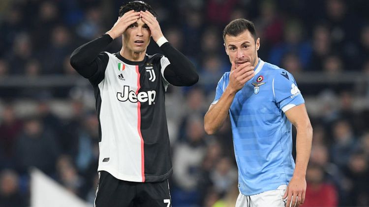 Lazio hand Juve first defeat of season after controversial red card