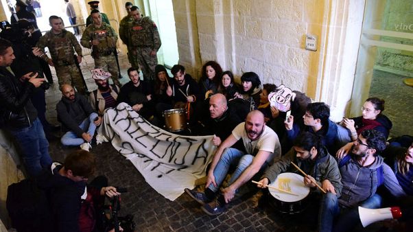 Activists storm into Maltese government HQ demanding PM's resignation Activists storm into Maltese government HQ demanding PM's resignation