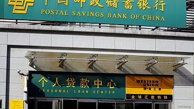 China's Postal Savings Bank gains 2.7% in tepid Shanghai debut