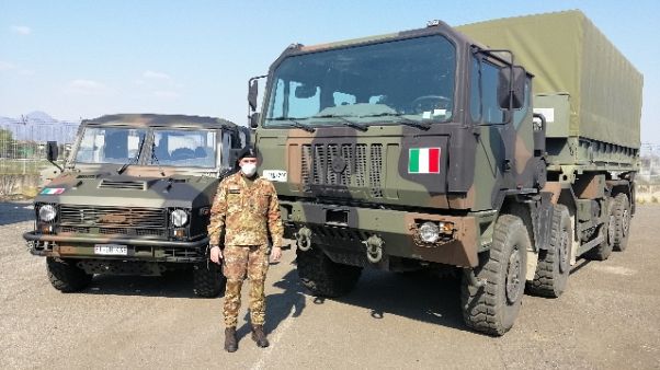 Squadra italo-russa sanifica rsa Bergamo Squadra italo-russa sanifica rsa Bergamo