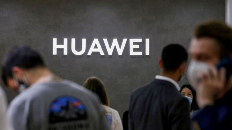 China's Huawei reports quarterly revenue drop as smartphone income hit