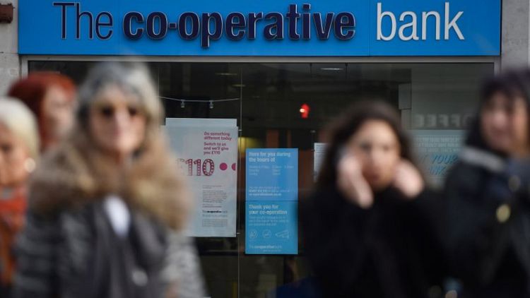 J.C. Flowers, Bain Capital Credit to buy into recovering Co-Op Bank