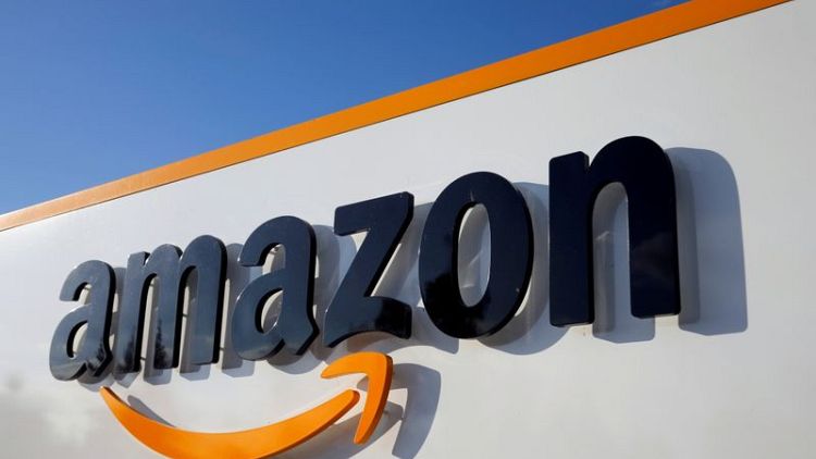 Amazon's sales and profit rise as retailer rides wave of pandemic shopping