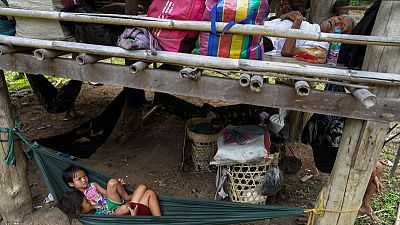 Thousands of Myanmar villagers poised to flee violence to Thailand, group says Thousands of Myanmar villagers poised to flee violence to Thailand, group says