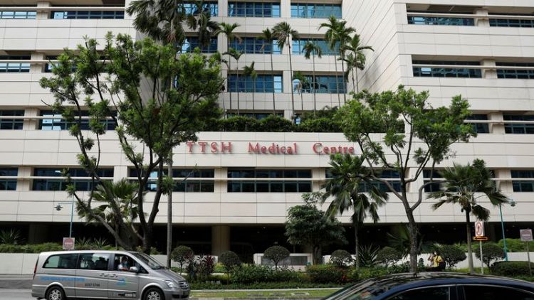 Singapore finds COVID-19 cluster in hospital as local cases climb