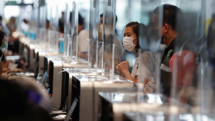 Thailand reports new daily record of 21 deaths in third virus wave