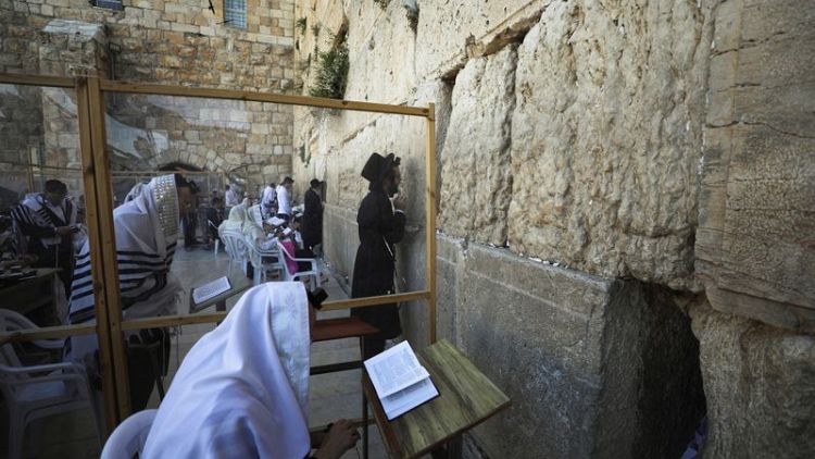 Israel observes day of mourning for religious festival dead