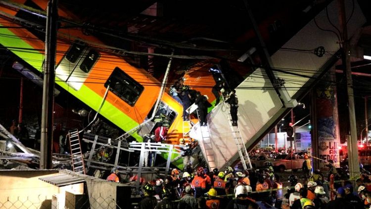 Mexico City rail overpass collapses, killing 13 and injuring 70