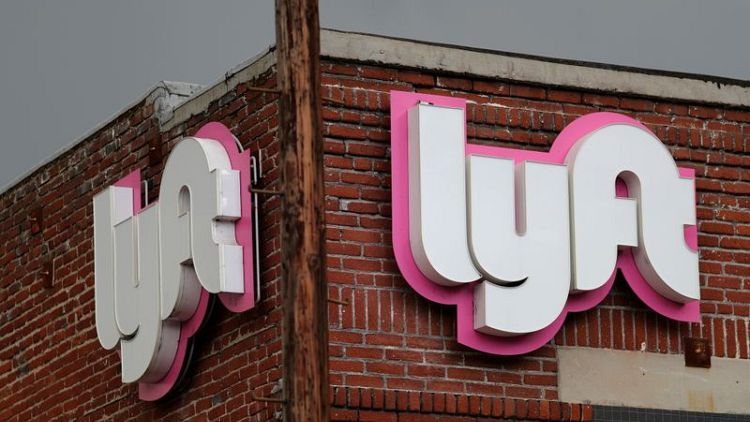 Lyft slashes losses with ongoing cost cuts, maintains third-quarter profit target
