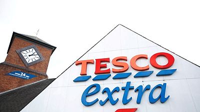Britain's Tesco concedes to activist shareholders on health targets