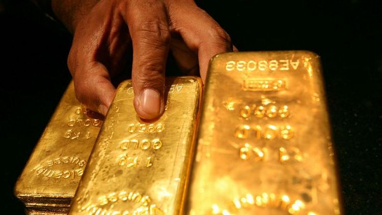 الذهب يهبط بعد تعليقات باول التي أعتبرتها الأسواق تميل لتشديد السياسة النقدية