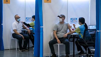 Hong Kong shortens coronavirus quarantine for vaccinated residents Hong Kong shortens coronavirus quarantine for vaccinated residents